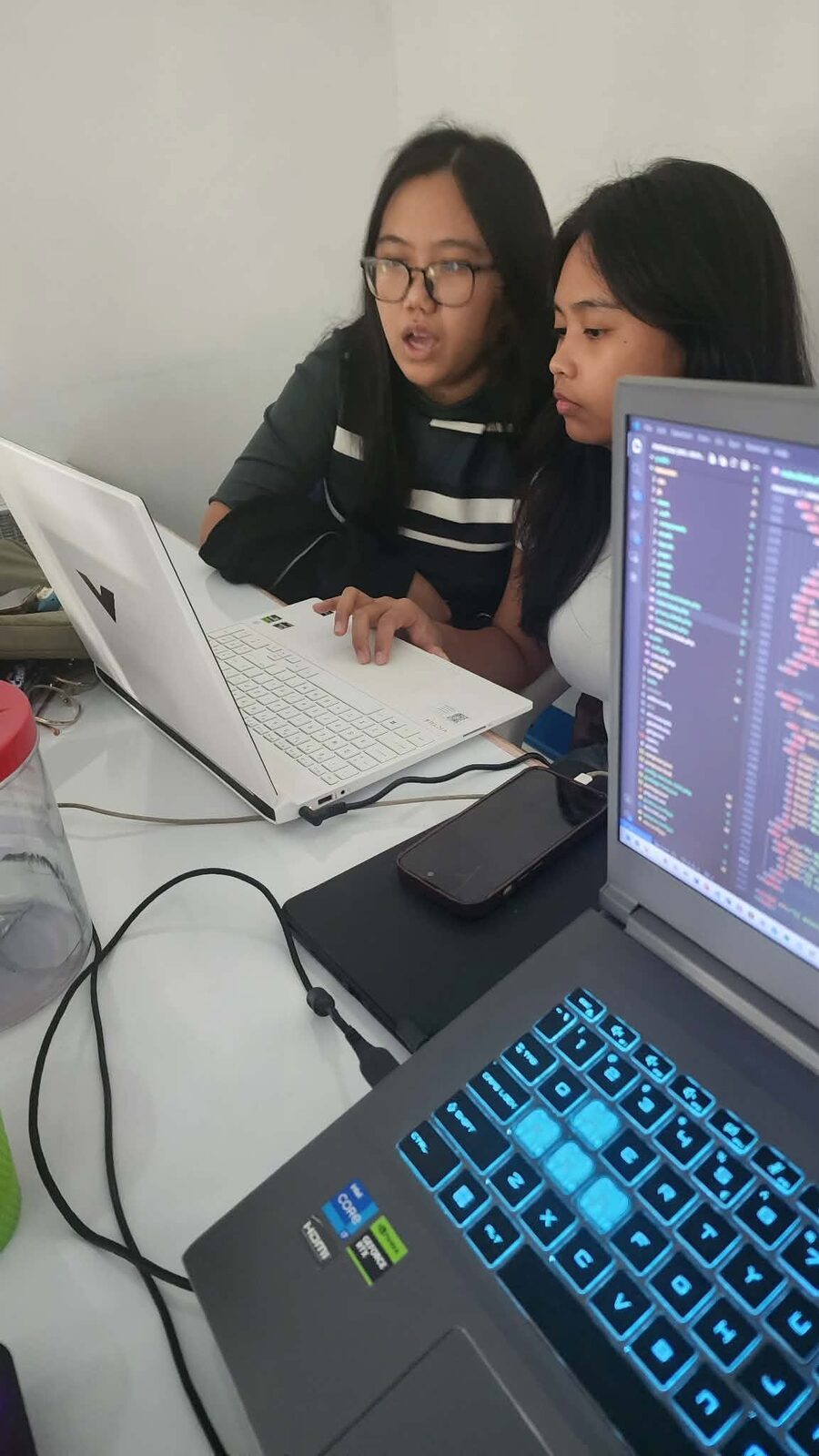 Pentascale founding team members pair-programming