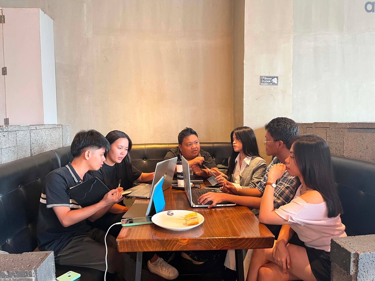 The Pentascale founding team meeting at a café